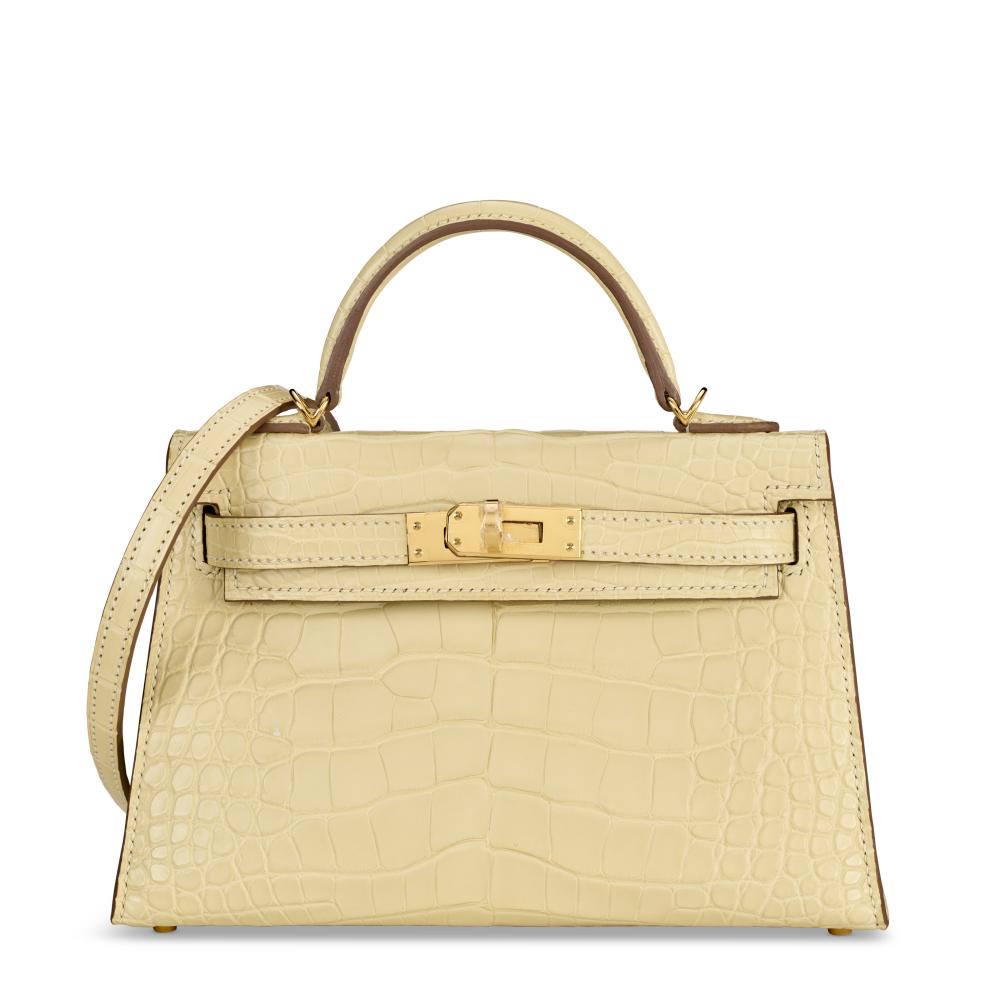 A MATTE VANILLE ALLIGATOR MINI KELLY 20 II WITH GOLD HARDWARE

HERMÈS, 2024

GRADE: 1.5 
20 w x 14 h x 6 d cm 
Includes shoulder strap, small dust bag, dust bag, felt protector, ribbon, care card and box.