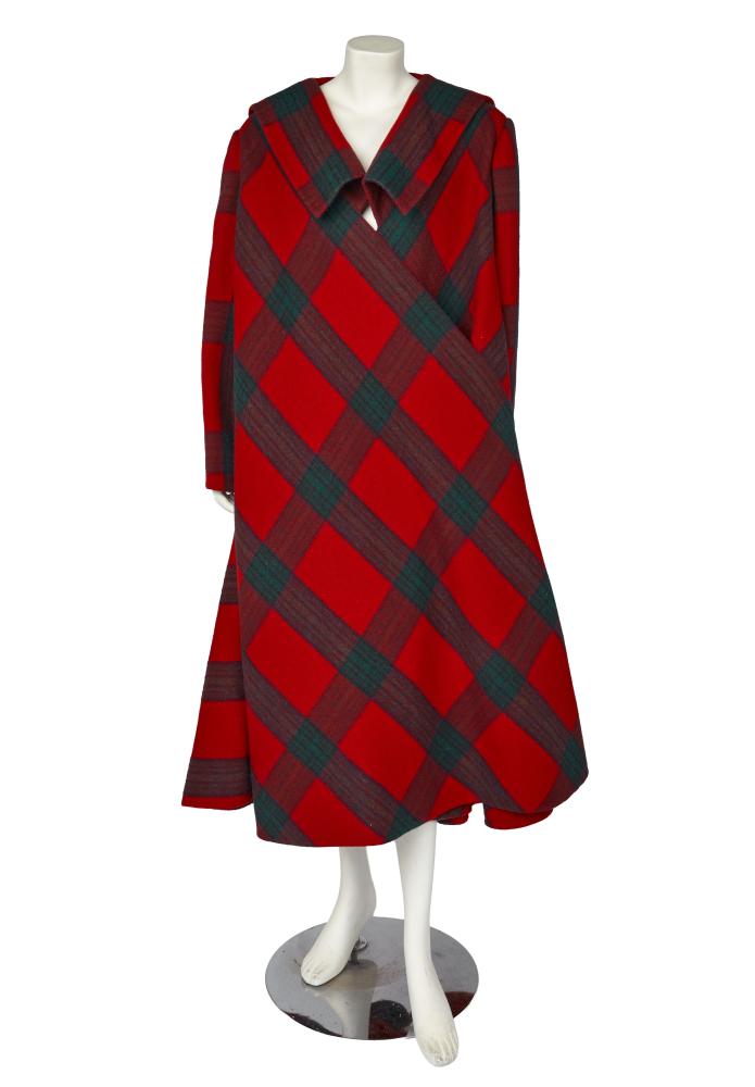 A Philippe Venet tartan wool swing coat, probably 1970s

A Philippe Venet tartan wool swing coat, probably 1970s

labelled, cleverly cut so that the pattern converges at the centre-back, woven with green bars on a red ground, single snap closure allowing one panel to hang freely, bust approx 102cm 40in

Share this lot: