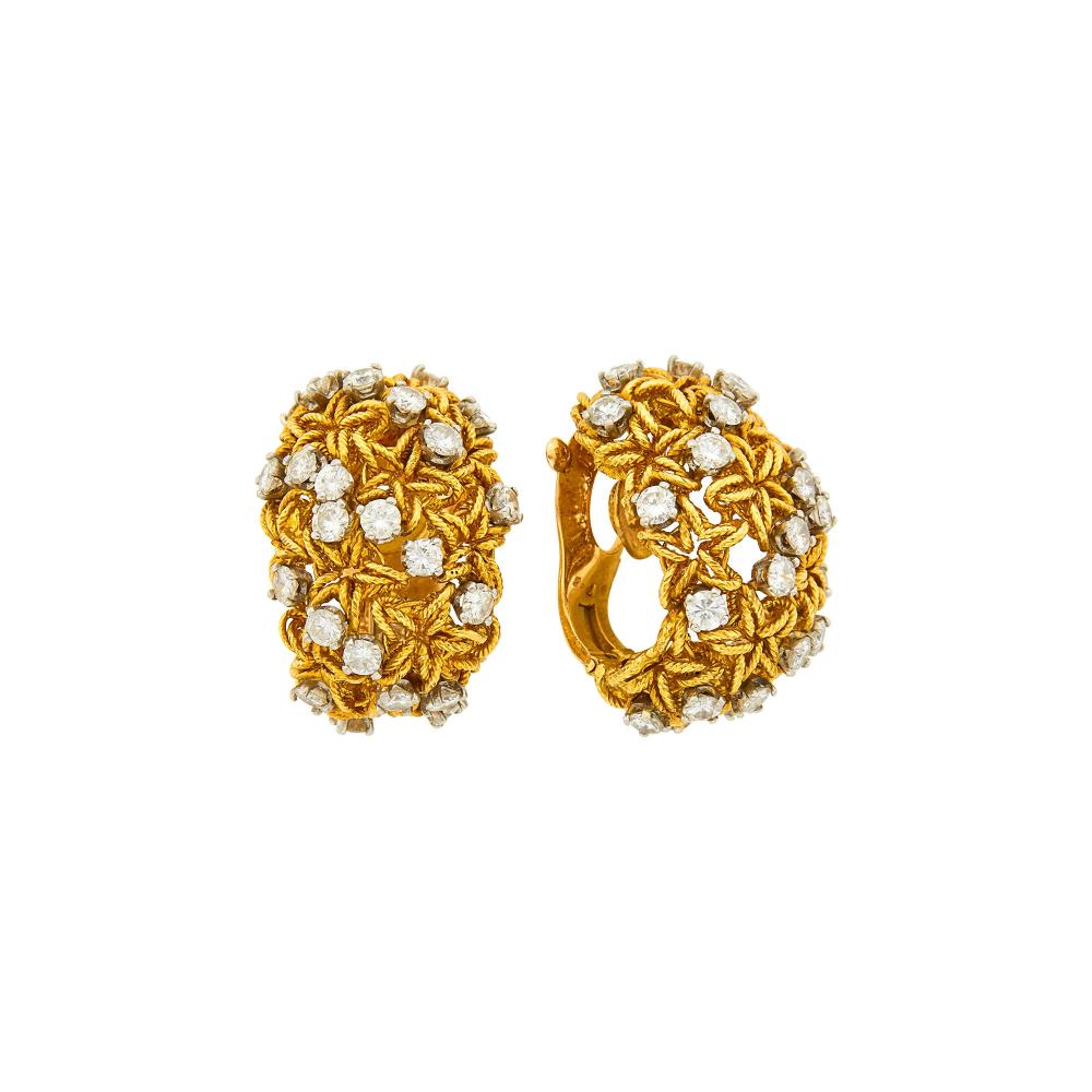 Property of a Distinguished Lady from Athens, Greece18 kt., 48 round diamonds ap. 3.75 cts., signed VCA France, no. NY48779, ’66’, with maker’s mark, ap. 17.8 dwts.

Diamonds: G-H-I-VS.Clip-backs. 1 x 3/4 inch.                            
Any condition statement is given as a courtesy to a client, is an opinion and should not be treated as a statement of fact and our Organization shall have no responsibility for any error or omission. Please contact the specialist department to request further information or additional images that may be available.