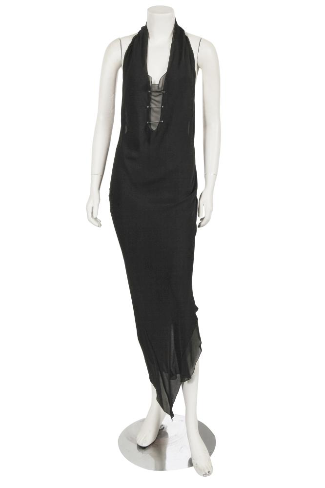 A Frederic Molenac haute couture black bias-cut silk dress, Autumn-Winter 2001-02

A Frederic Molenac haute couture black bias-cut silk dress, Autumn-Winter 2001-02

labelled, size 40, the halterneck dress with plunging neckline secured with metal barbells, with low open back, asymmetric hem, bust approx 96cm 38in

Share this lot: