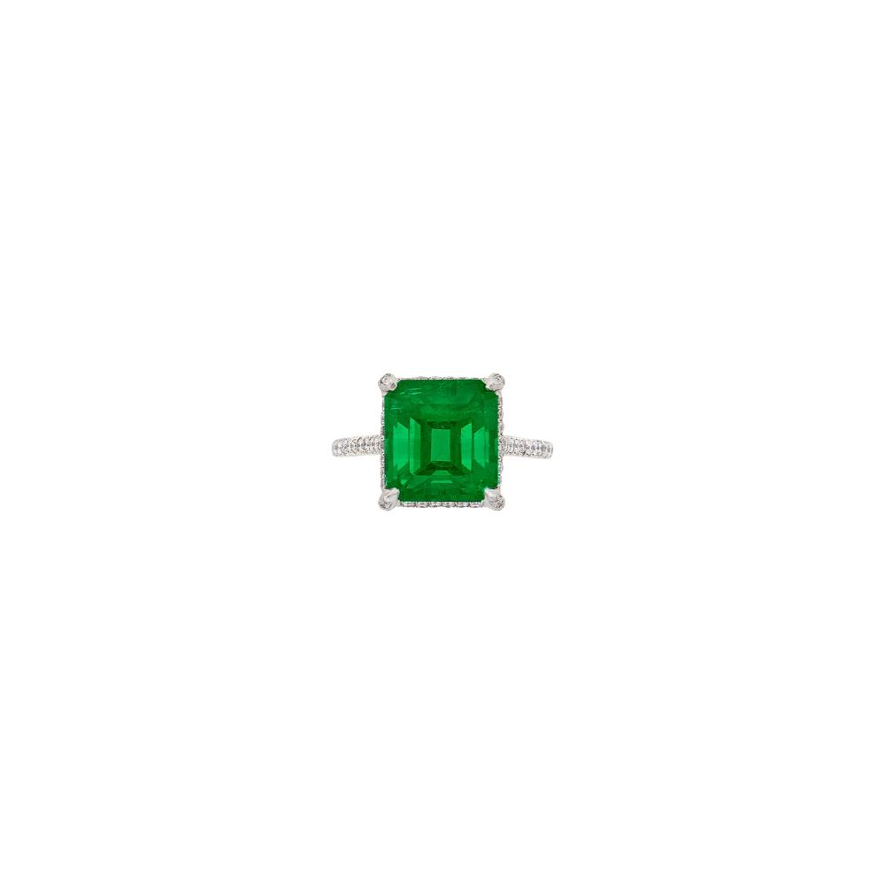 The Collection of a California Movie ProducerOne emerald-cut emerald weighing 5.54 cts., small round diamonds ap. .85 ct., signed N. Lane, with maker’s mark. Size 6.
 
With AGL report no. 1152013 stating Zambian origin, with Minor Traditional clarity enhancement.

Emerald: vivid green, good color concentration, cleanish center, moderately included in one corner, good transparency, deep pavilion, lively.Diamonds: G-H-VS.Width 7/16 inch.                            
Any condition statement is given as a courtesy to a client, is an opinion and should not be treated as a statement of fact and our Organization shall have no responsibility for any error or omission. Please contact the specialist department to request further information or additional images that may be available.