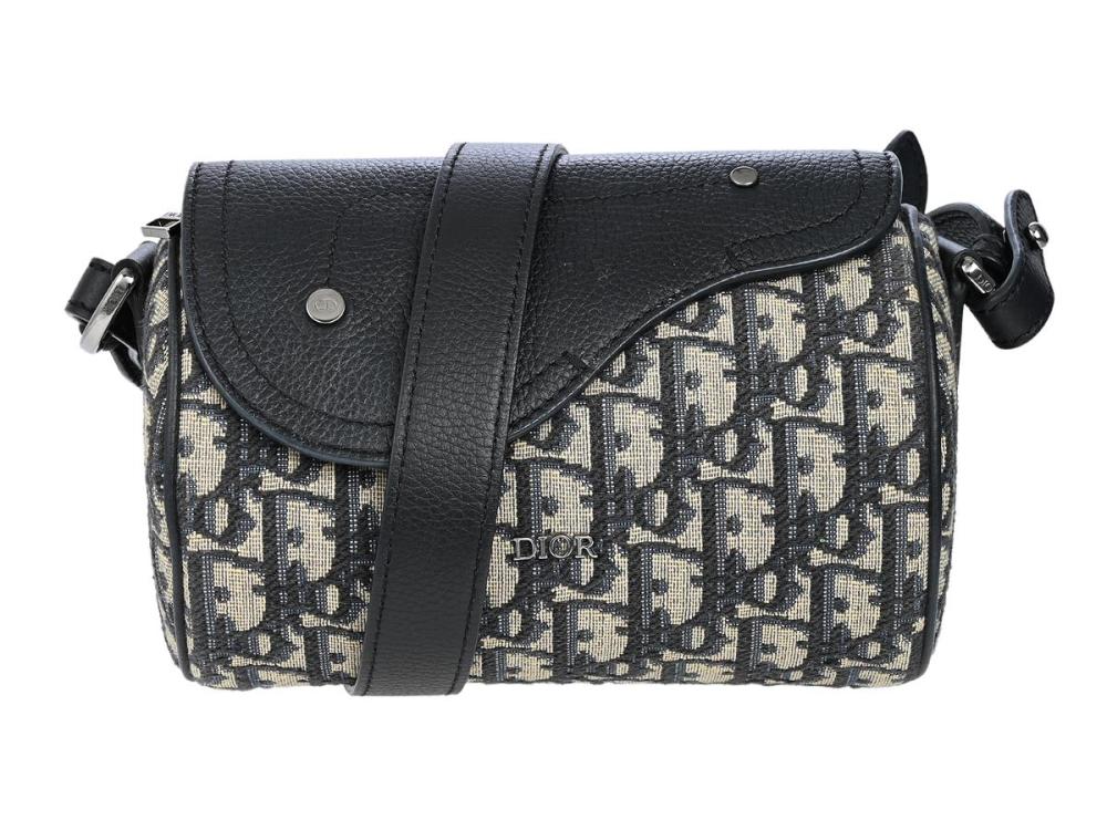 Accessories

Handbags

DIOR, BAG, Mini Roller Saddle Bag, Oblique Canvas, blue leather, dark silver-tone hardware, 17,5x12x11 cm, marked 20-BO-1212, detachable and adjustable shoulder strap. Very Good Condition.