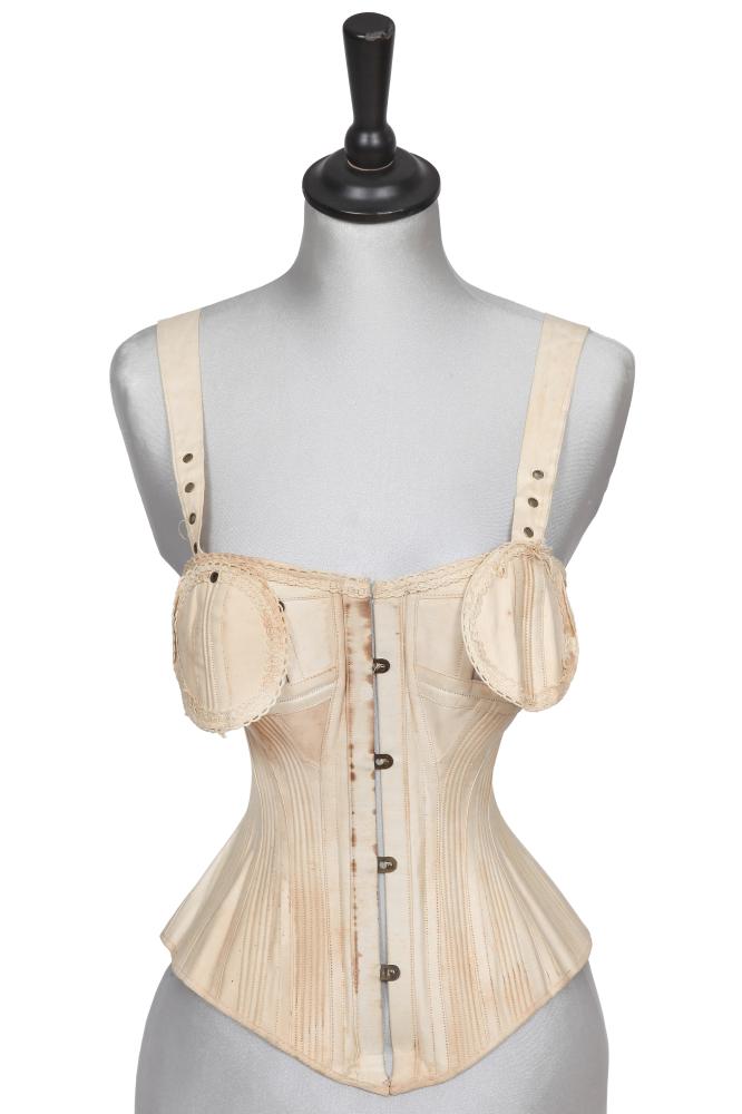 A Warner Brothers Coraline cotton-twill nursing corset, 1881

A Warner Brothers Coraline cotton-twill nursing corset, 1881

stamped Dr. Warners, the corded corset with boning to centre back, steel busk to front, cut-outs over each breast, modesty panels attached with grommet for access, adjustable shoulder straps, waist approx 56cm 22in

The Warner Brothers Corset Company was co-founded by brothers Dr Lucien Warner and Dr Ira De Ver Warner in 1874. Both were prominent doctors who decided to abandon their medical practices in an effort to develop a more healthful, flexible corset. Dr Warner’s Coraline Health Corsets were made of ’Coraline’, produced from the fibres of the Mexican Ixtle plant. By 1876, these ’health corsets’ had grown in popularity so much so that the company was producing approximately 6,000 corsets daily. In 1883, Harper’s Bazaar advertised the four most popular corsets in America as Dr Warner’s models. In 1914 they bought the patent for the brassiere from inventor Mary Phelps Jacob, who had invented the brassiere a year earlier. In 1968, the company’s name was changed to Warnaco, and it rapidly expanded throughout the second half of the twentieth century. In 2011, Warnaco was operating with a yearly revenue of US$2.51 billion and owned the patents for Speedo. It was a main producer of underwear for Calvin Klein, Victoria’s Secret, Fruit of the Loom, and Ralph Lauren. In 2013, Warnaco was acquired by PVH, which sold the brand to Basic Resources Inc. in 2023, a major producer of legwear, loungewear, and underwear.

An almost identical nursing corset is held in the collection of the Missouri Historical Society.

Share this lot: