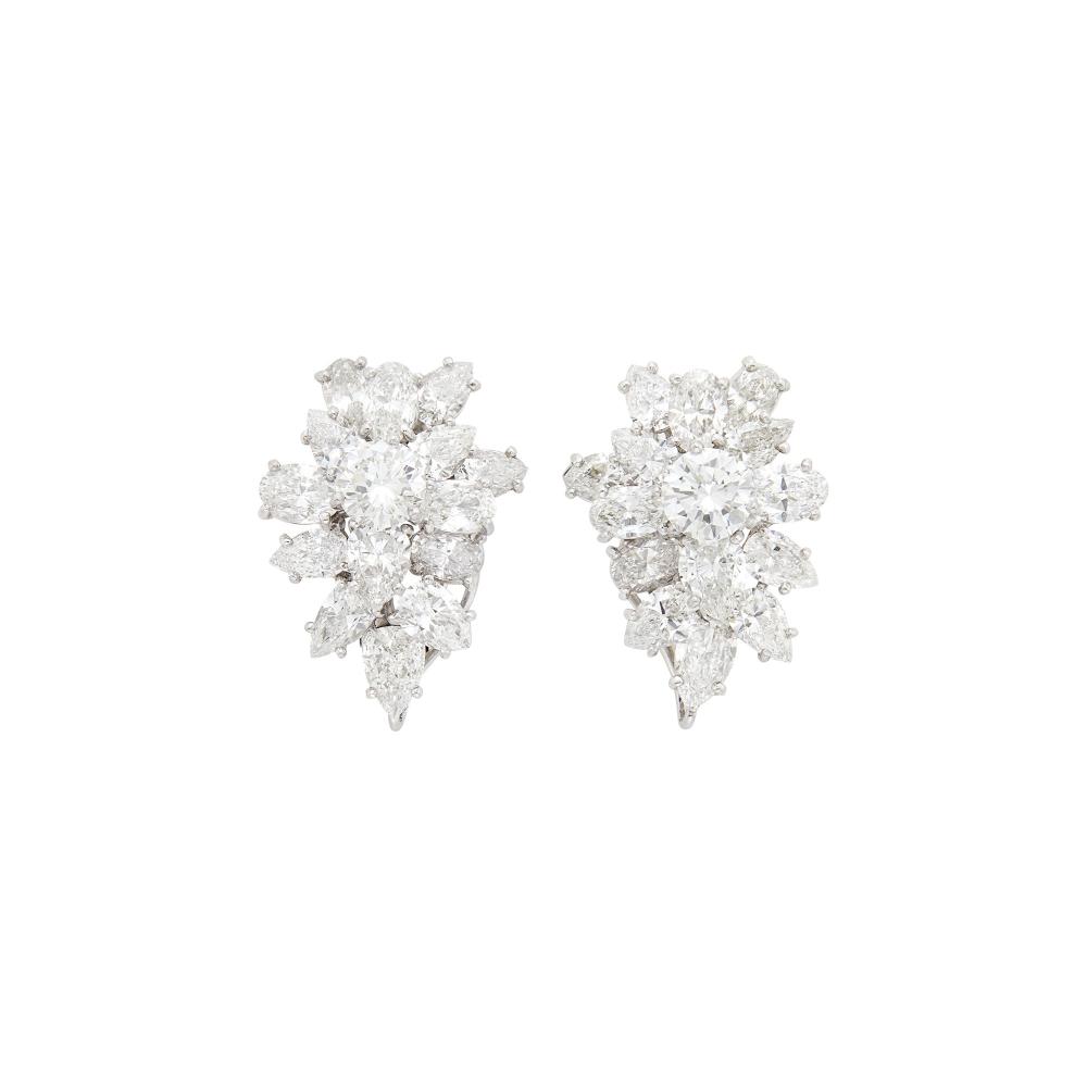 Property from a Prominent Maryland Collection2 round diamonds ap. 1.70 cts., 10 oval and 18 pear-shaped diamonds ap. 9.00 cts., with concealed pendant hooks, ap. 9.5 dwts.

Diamonds: H-I-J-VS-SI.Clip-backs. 7/8 x 11/16 inch.                            
Any condition statement is given as a courtesy to a client, is an opinion and should not be treated as a statement of fact and our Organization shall have no responsibility for any error or omission. Please contact the specialist department to request further information or additional images that may be available.
