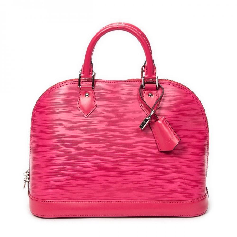 Description

LOUIS VUITTON.
Alma bag.
In Epi leather in Hot Pink color, with top zipper closure and two short rigid handles, lined in smooth leather. Interior matching the exterior color, with two pockets. Silver hardware.
Includes shoulder strap and keys in its respective clochette.
With interior numbering.
In perfect condition, hardly used.
Measurements: 30 x 23 x 15 cm.