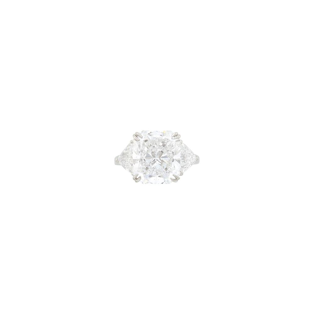 Property from the Collection of Augusta PattonOne cut-cornered rectangular modified brilliant diamond weighing 10.31 cts., 2 trilliant-cut diamonds ap. 2.30 cts. Size 7 1/2
 
With GIA report no. 6233866538 stating D color, I1 clarity.

Diamond: D-I1, no fluorescence, inclusions not easily to slightly visible to eye, brilliant.Side diamonds: F-G-SI.                            
Any condition statement is given as a courtesy to a client, is an opinion and should not be treated as a statement of fact and our Organization shall have no responsibility for any error or omission. Please contact the specialist department to request further information or additional images that may be available.