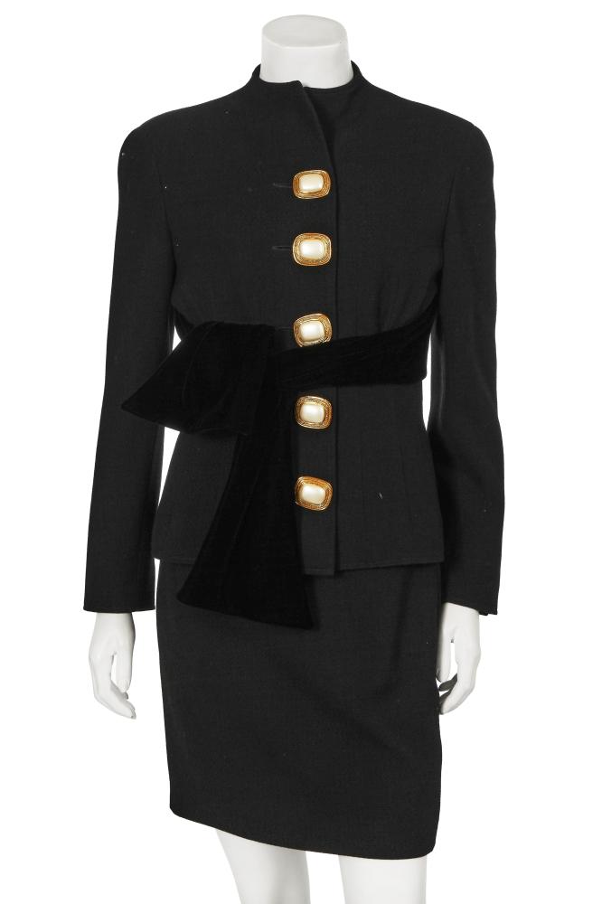 A Valentino Garavani black wool and velvet cocktail ensemble, circa 1990

A Valentino Garavani black wool and velvet cocktail ensemble, circa 1990

Boutique labelled, comprising: a strapless mini dress with velvet bodice, wool skirt, size 8, bust 86cm 34in; and a matching black wool jacket with stand collar, large gilt and faux blister-pearl buttons, integral black velvet sash belt, size 8, 91cm 36in (2)

Share this lot: