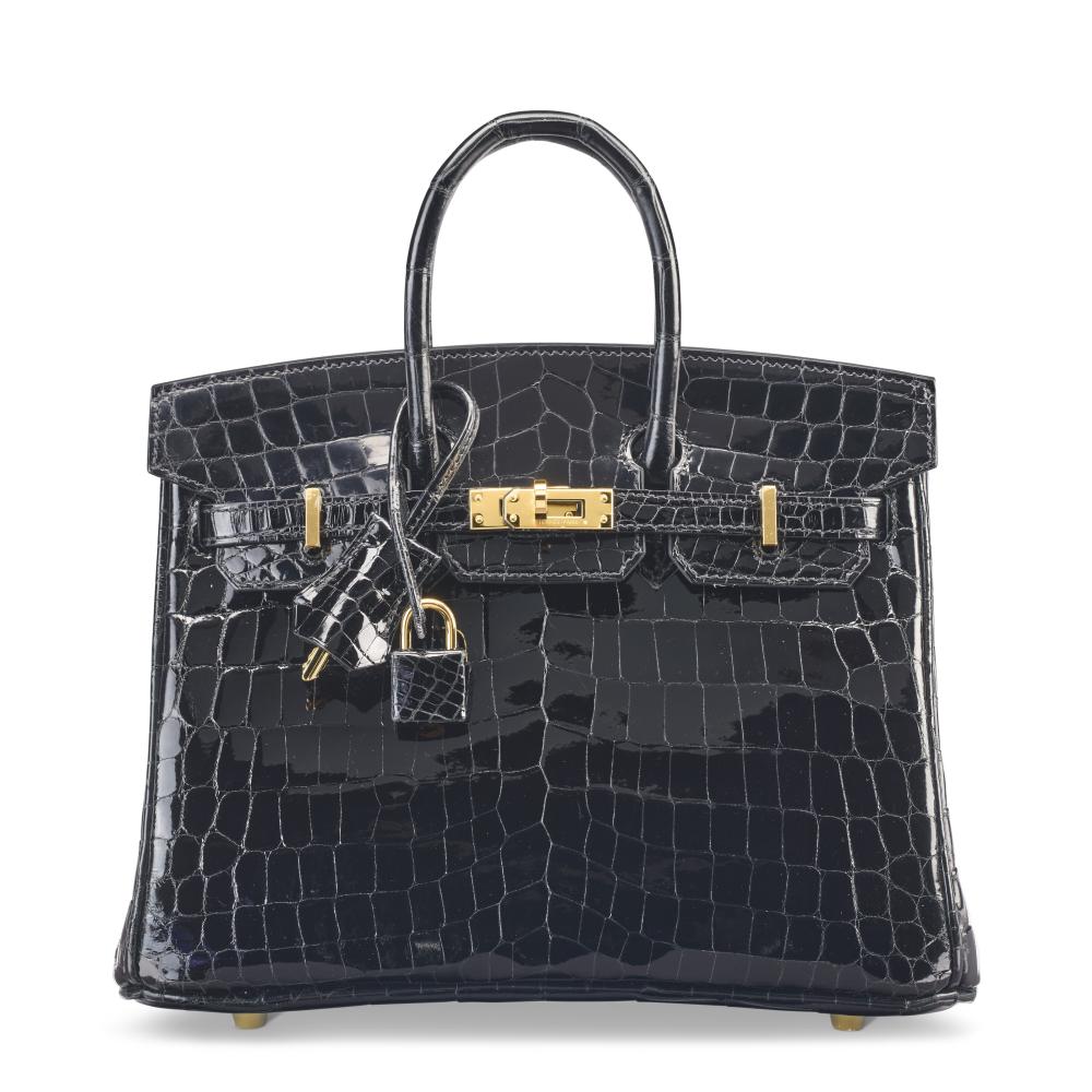 A SHINY BLACK NILOTICUS CROCODILE BIRKIN 25 WITH GOLD HARDWARE

HERMÈS, 2023

GRADE: 1.5 
25 w x 19 h x 14 d cm 
Includes lock, keys, clochette, small dust bag, dust bag, felt protector, care card, ribbon, and box.