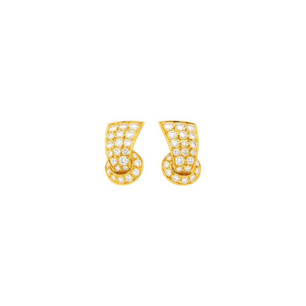 The Martin and Lynn Halbfinger Collection18 kt., 48 round diamonds ap. 1.50 cts., signed Van Cleef & Arpels, no. G3176, A2, with maker’s mark and French assay mark, ap. 4.8 dwts.

Diamonds: F-G-VSClip-backs. 5/8 x 3/8 inch.                            
Any condition statement is given as a courtesy to a client, is an opinion and should not be treated as a statement of fact and our Organization shall have no responsibility for any error or omission. Please contact the specialist department to request further information or additional images that may be available.