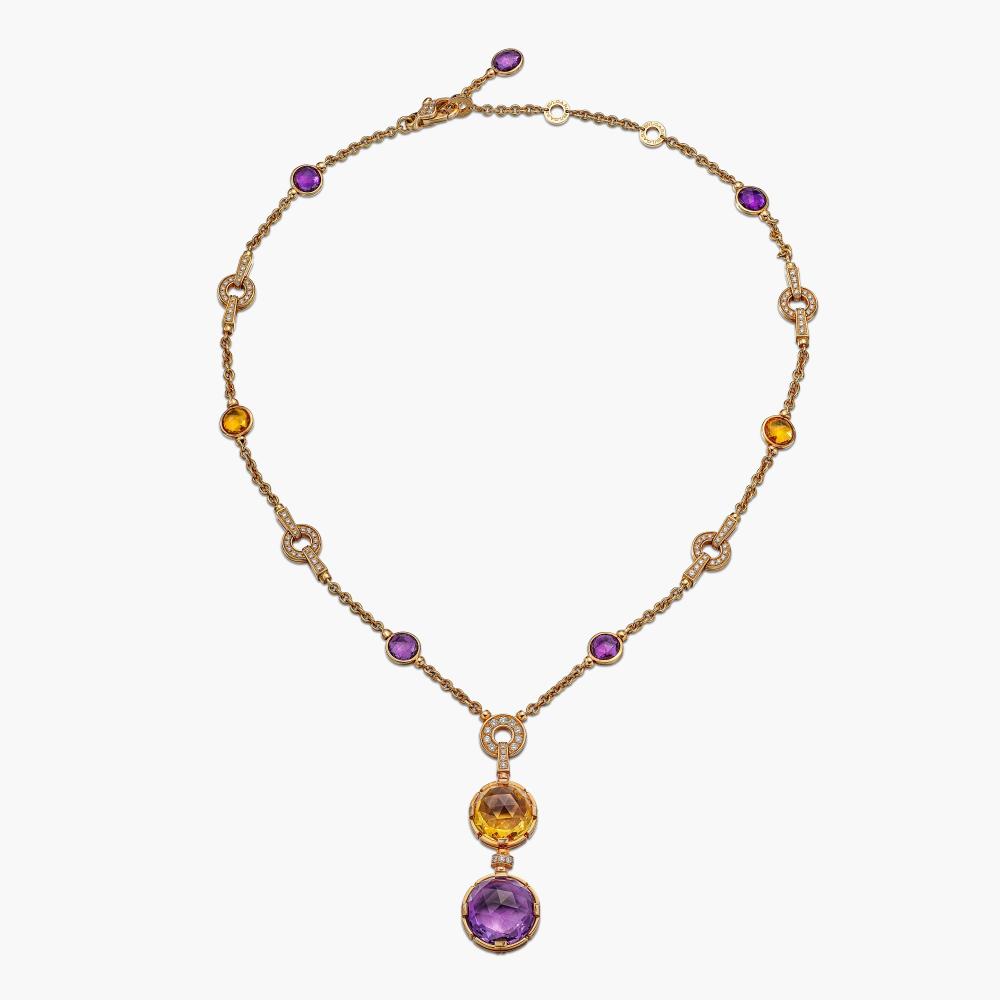 Bulgari

Set with checkerboard-cut amethysts and citrines, decorated with brilliant-cut diamonds.