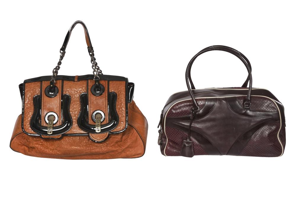 Two designer handbags, 2000s

Two designer handbags, 2000s

both signed, comprising: a Prada ’bowling ball’ bag, Spring-Summer 2000, of maroon leather with perforated leather to front and back, contrasting white leather trim, combination padlock, approx 40x21cm, 15.5x8in; a Fendi ’B’ bag, circa 2007, of brown leather with black patent leather trim, two oversized black buckles with FF Fendi logo cut-out clasps, approx 46x27cm, 18x10.5in (2)

Share this lot: