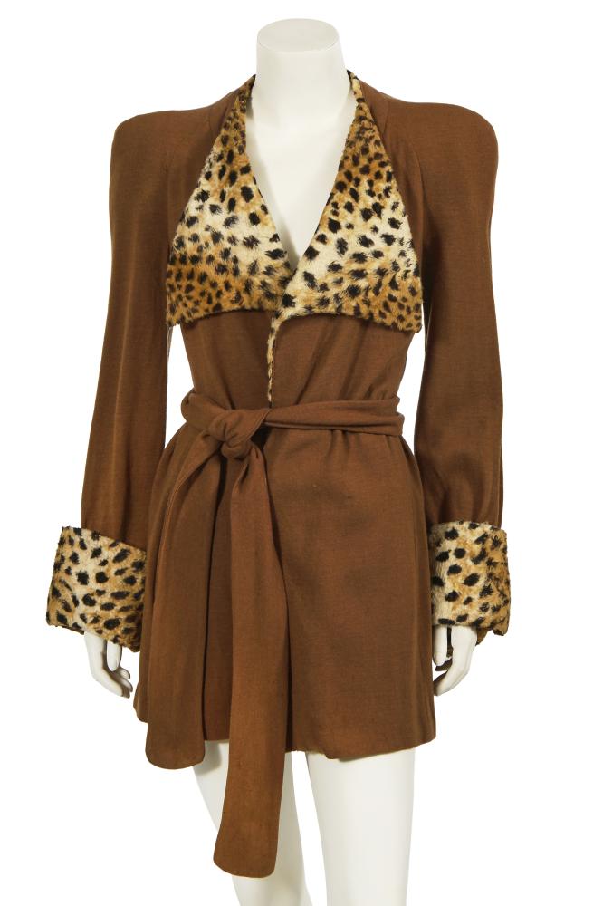 A Biba wool and faux-fur jacket, 1973-75

A Biba wool and faux-fur jacket, 1973-75

printed art nouveau label, the angular lapels and wide cuffs of faux leopard-fur, with padded shoulders, matching belt, bust approx 91cm 36in

Share this lot: