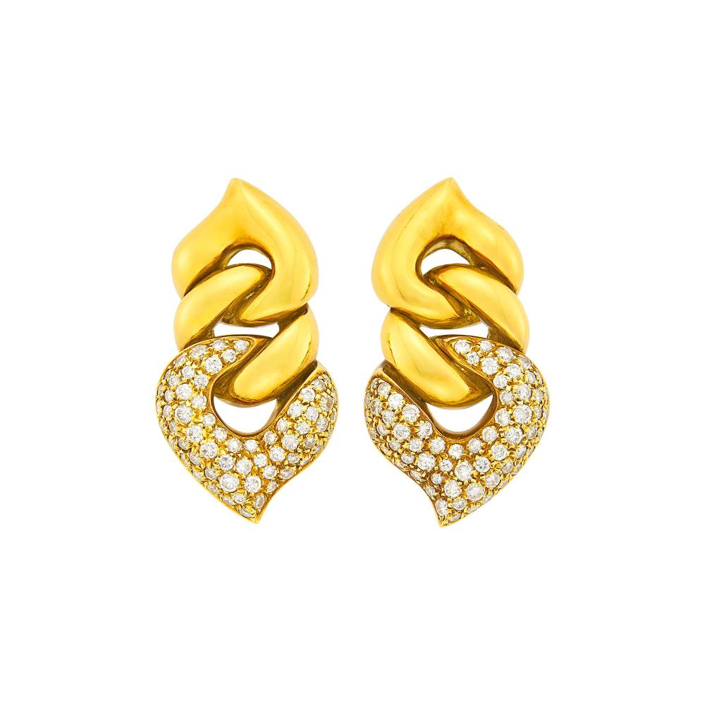 18 kt., 128 round diamonds ap. 3.50 cts., signed Bulgari, BA1988, with Italian assay marks, ap. 19 dwts.

Diamonds: G-H-I-VS.Clip-backs. 1 1/2 x 13/16 inches.                            
Any condition statement is given as a courtesy to a client, is an opinion and should not be treated as a statement of fact and our Organization shall have no responsibility for any error or omission. Please contact the specialist department to request further information or additional images that may be available.