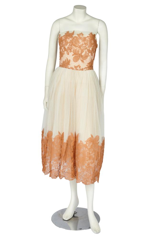 A Lanvin Castillo for Nanty dance dress, American, 1950s

A Lanvin Castillo for Nanty dance dress, American, 1950s

labelled, of cream point d’esprit edged in cinnamon lace, with strapless lightly boned bodice, layered petticoats, bust approx 86cm 34in, waist 66cm 26in

Share this lot: