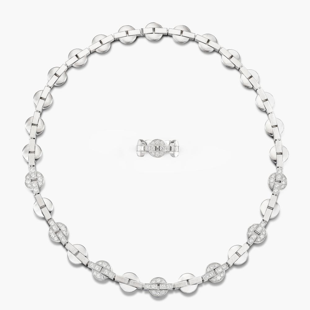 Cartier

Comprising: necklace designed as circular links, decorated with brilliant-cut diamonds, and ring en suite.