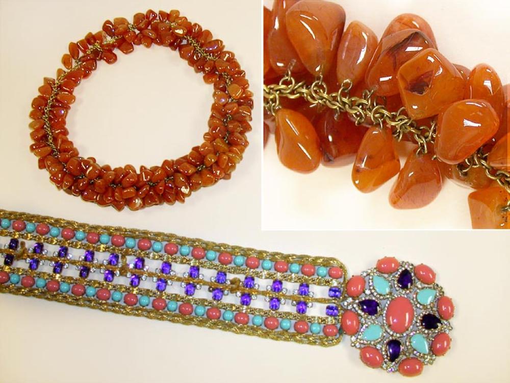 Opulent Kenneth Jay Lane Belt

Lot 921
Opulent Kenneth Jay Lane Belt
 American, late 1960s 
 Scroll links and twisted rope strands of gilt-metal surrounding inset faux coral, turquoise and sapphire stones, rhinestone accents, circular clasp, 31 x 3 inches, labeled: K.J.L; Together with a Collarette of Carnelian Clusters on a Gilt-Metal Chain. 
Very good condition, some repair on back of belt clasp.