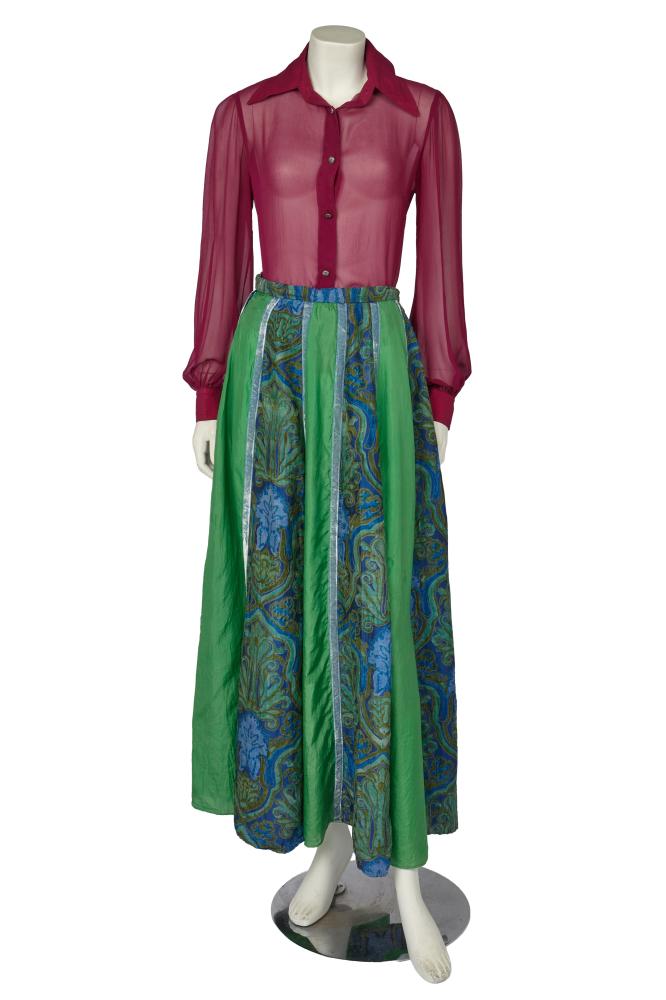 A Thea Porter blouse and skirt, 1970s

A Thea Porter blouse and skirt, 1970s

comprising: a magenta chiffon blouse with marquisette buttons, bust approx 86cm 34in; and a green and blue panelled silk maxi skirt, trimmed with silver-grey velvet ribbons, Couture labelled, waist 61cm 24in (2)

Provenance: the late Lola Yearwood collection

Share this lot: