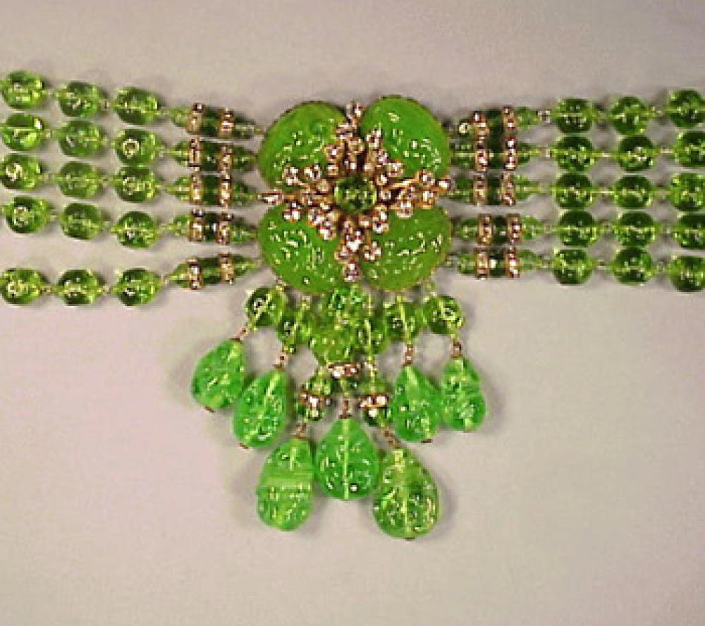 Miriam Haskell Green Choker

Lot 236
Miriam Haskell Green Choker
 Lime green bead strands, flower matrix, teardrop pendants, marked.