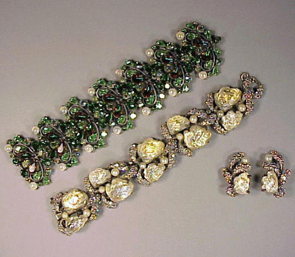 Group of Schiaparelli Jewelry 1950s

Lot 480
Group of Schiaparelli Jewelry 1950s
 1950s 
 One green stone bracelet, one iridescent translucent stone bracelet and earrings, each marked.