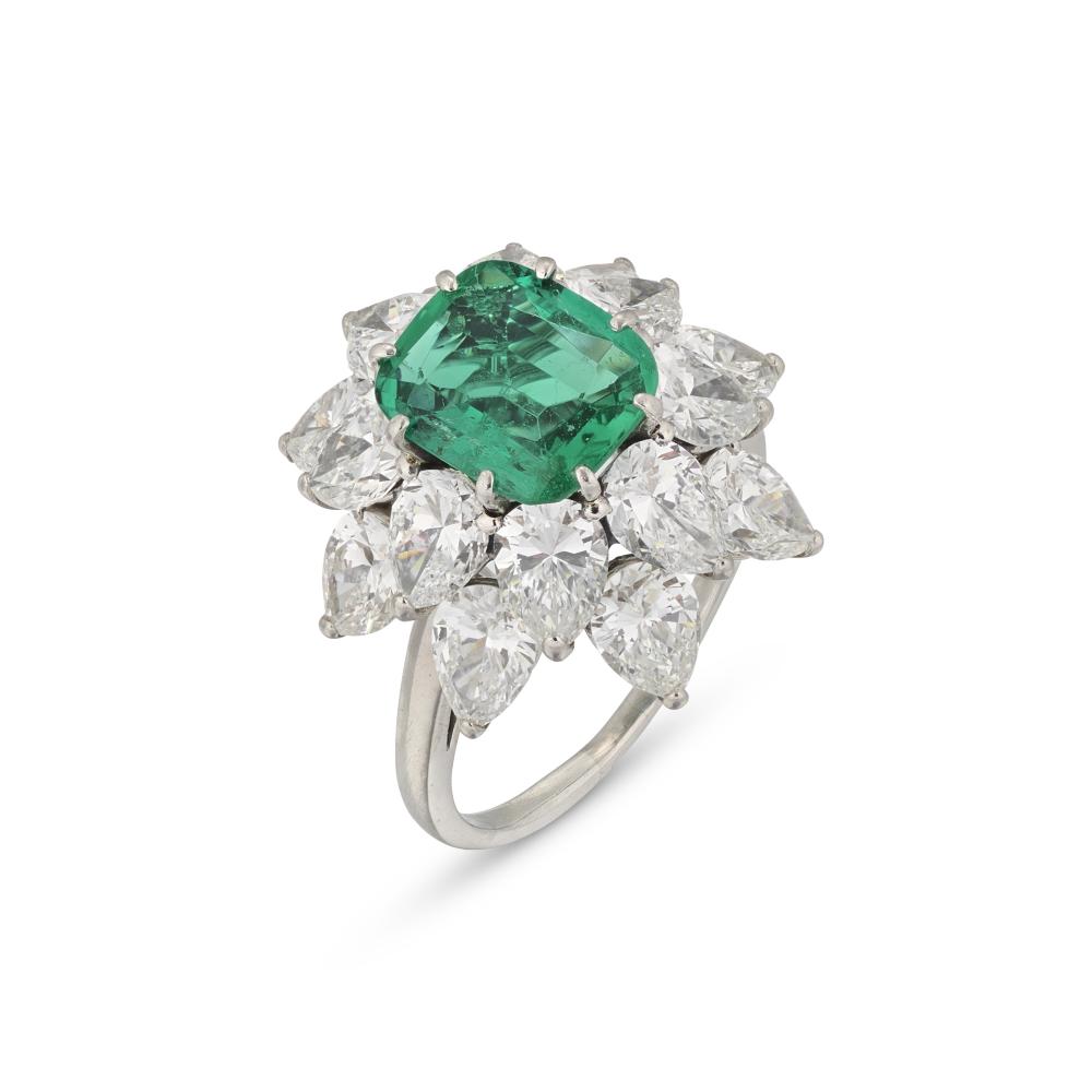 BULGARI EMERALD AND DIAMOND RING

Rectangular cushion-shaped emerald, pear-shaped diamonds, 1960s, signed Bvlgari, red Bulgari case 
GCS, 2026, report no. 5786-2544: Colombia, minor amount of oil in fissures 
Size/Dimensions: UK ring size L¹⁄₂ 
Gross Weight: 7.9 grams