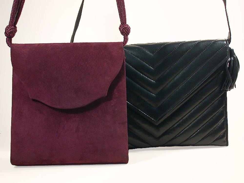 Two Yves Saint Laurent Handbags

Lot 881
Two Yves Saint Laurent Handbags
 The first a violet suede square shoulder bag with a curved flap and same color cord strap, 7 x 7 inches; the second a black chevron quilted envelope clutch with ornamental leather tassel and optional leather shoulder strap, 9 1/2 x 7 inches, both labeled: Yves Saint Laurent. 
Both in good condition, showing some wear.