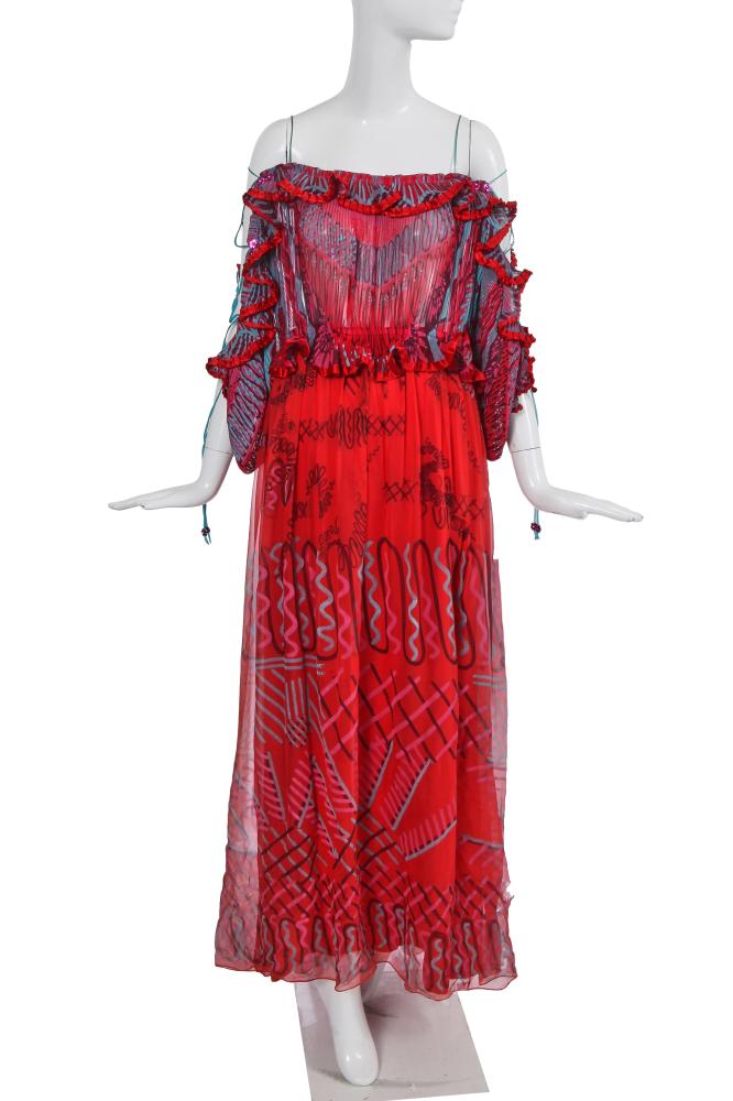 A Zandra Rhodes printed chiffon dress, 1975

A Zandra Rhodes printed chiffon dress, 1975

labelled, the pleated bodice printed with teal and pink ’Lace Mountain’ repeats on a red ground, the off-the-shoulder neckline and sleeves with blue lacing, trimmed with pleated red trim spangled with hot pink floral paillettes, the gathered maxi-length skirt printed with ’Spinifex Landscape’ repeats, waist approx 76cm 30in

Provenance: Lady Linda Vane Percy

Share this lot: