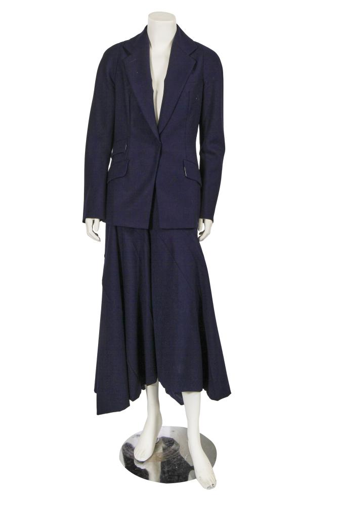 A Vivienne Westwood navy blue wool-blend suit, mid-1990s

A Vivienne Westwood navy blue wool-blend suit, mid-1990s

gold on ivory labels, size UK 14, comprising: a tailored jacket with three welted pockets, lined in orb-monogram satin, bust 86cm 34in; and a matching mid-length skirt with asymmetric seams, waist 71cm 28in (2)

Share this lot: