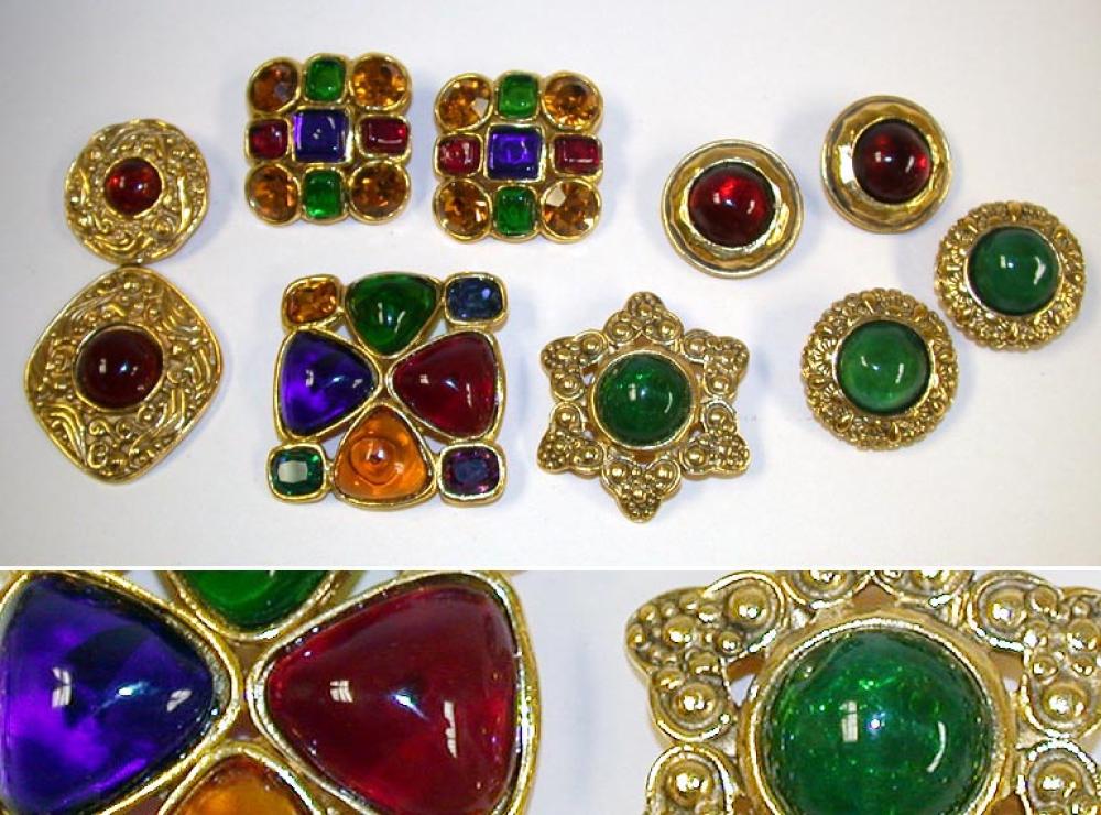 Group of Simulated Stone Chanel Jewelry

Lot 944
Group of Simulated Stone Chanel Jewelry
 French, 1980s 
 All with gilt-metal, the first a square pin with faux cabochon emerald, ruby, sapphire and amber stones, with a matching pair of earclips, the second a circular pin with a single faux emerald within a frame of gilt-metal leaves, pair of similar round earclips, and a pair of circular earclips inset with faux ruby, all marked: Chanel. 
Excellent condition.