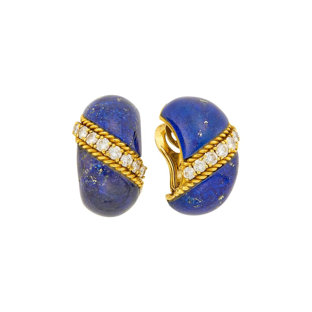 Property of a Distinguished Lady from Athens, Greece18 kt., four bombé lapis panels, 18 round diamonds ap. 2.30 cts., signed VCA, Made in France, no. NY43942, with maker’s marks and French assay marks, ap. 20 dwts. gross.

Lapis: medium deep blue, visible patches of pyrite, very good luster.Diamonds: H-I-VS.Clip-backs. 1 1/8 x 3/4 inches.                            
Any condition statement is given as a courtesy to a client, is an opinion and should not be treated as a statement of fact and our Organization shall have no responsibility for any error or omission. Please contact the specialist department to request further information or additional images that may be available.