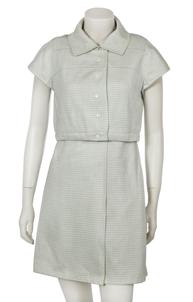 An André Courrèges white and baby blue checked ensemble, early 1970s

An André Courrèges white and baby blue checked ensemble, early 1970s

Hyperbole label, size A, of knitted acrylic, the pinafore dress with detachable press-stud epaulettes, integral belt, kick split to front hem, back zip closure, numbered 0543281, bust 91cm 36in; the matching cropped jacket with cap sleeves, spread collar, snap closures, numbered 0556637, bust 97cm 38in (2)

Share this lot: