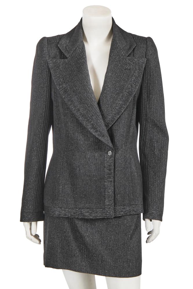 A Givenchy by Alexander McQueen grey wool and lurex suit, Autumn-Winter 1998-99

A Givenchy by Alexander McQueen grey wool and lurex suit, Autumn-Winter 1998-99

couture label, size 42, of grey wool woven with lurex self-stripes and trim, the jacket with broad peaked lapels, metal buttons embossed with Chinese lu symbols, bust 102cm 40in; with a matching mini skirt, waist 76cm 30in (2)

Share this lot: