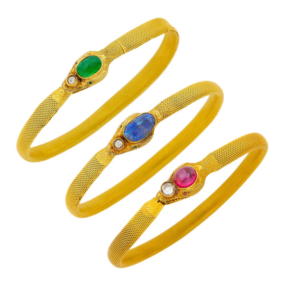 Property of a Prominent Collector18 kt., one cushion-shaped sapphire ap. 2.50 cts., one oval star ruby ap. 7.8 x 6.5 mm., one oval cabochon emerald ap. 8.8 x 6.0 mm., one old-mine and 2 rose-cut diamonds, all signed PD, two with maker’s mark on tongues, ap. 37.6 dwts. Lengths 7 and 7 1/8 inches.
 Please note that the condition report was updated, stating there is evidence of solder repair with crack to gold on reverse.

Several minor dents to mesh.Sapphire: medium cornflower blue, some zoning, moderately included, minor table edge abrasions.Star ruby: medium deep pinkish red, weak star, translucent, good polish.Emerald: medium green, moderately included, several surface-reaching, medium polish.Mesh width 1/4 inch.                            
Any condition statement is given as a courtesy to a client, is an opinion and should not be treated as a statement of fact and our Organization shall have no responsibility for any error or omission. Please contact the specialist department to request further information or additional images that may be available.