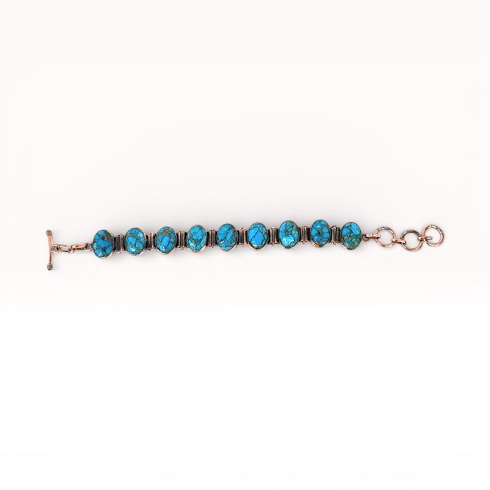 Description
cabochon turquoise blue howlite bracelet set in copper. 8 inches overall.