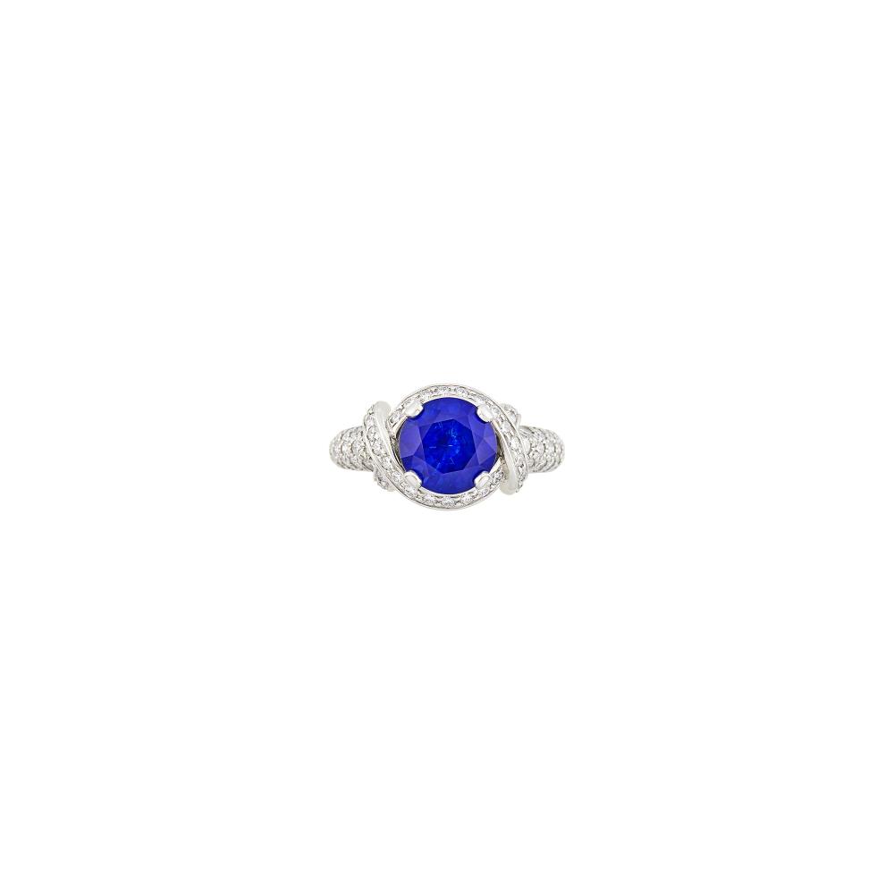 One round sapphire weighing 3.59 cts., weight inscribed, 82 round diamonds ap. 1.15 cts., signed Tiffany & Co., Schlumberger Studios, ap. 5.8 dwts. Size 6 3/4.
With GIA report no. 2235900315 stating Madagascar orign, Heated.

Sapphire: deep vivid blue with brighter blue highlights, cleanish, deep pavilion, lively.Diamonds: G-H-VS.Width 7/16 inch.                            
Any condition statement is given as a courtesy to a client, is an opinion and should not be treated as a statement of fact and our Organization shall have no responsibility for any error or omission. Please contact the specialist department to request further information or additional images that may be available.