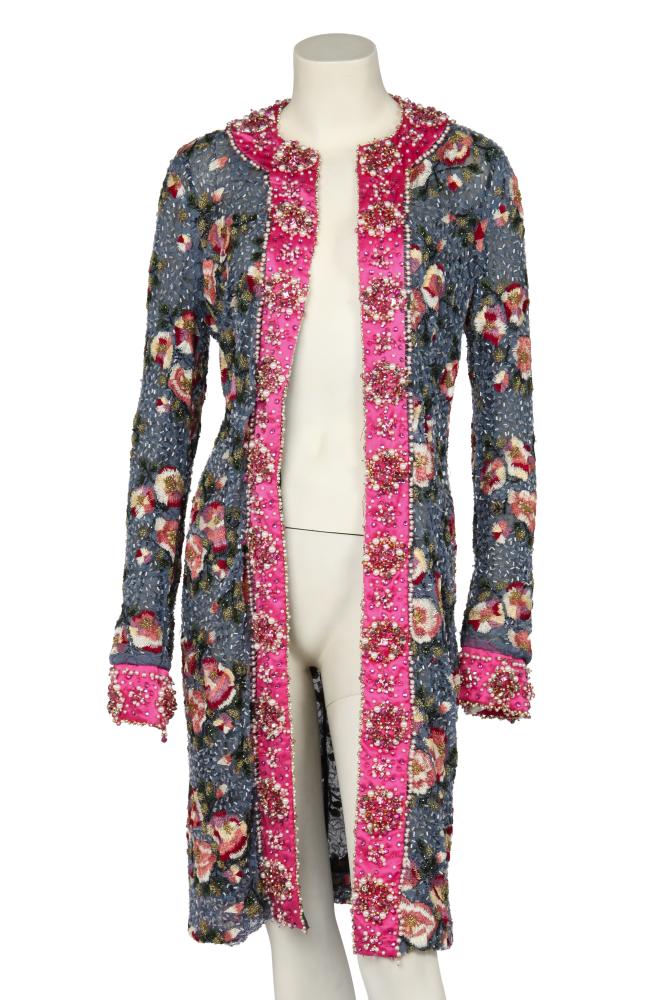 A Dolce & Gabbana beaded and embroidered evening coat, Autumn-Winter 1999-2000

A Dolce & Gabbana beaded and embroidered evening coat, Autumn-Winter 1999-2000

labelled, the blue lace ground spangled with blue bugle beads and embroidered with roses with gold and green bugle bead accents, edged in pink satin with pearl beads and pink crystals, chest approx 97cm 38in

Share this lot: