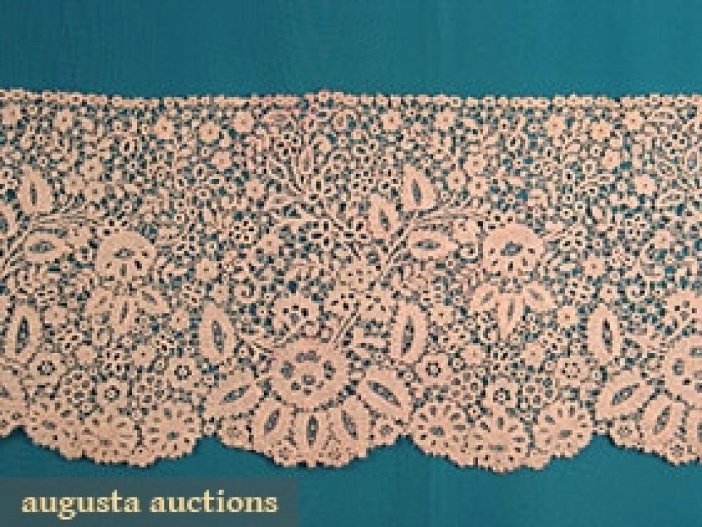 FINE CARRICKMACROSS LACE FLOUNCE, c. 1900

All over floral pattern w/ needlelace fillings, 13" x 86", (small area w/ faint red stain at edge) excellent.		
Bid Online
Price Realized: $243.75Category:LaceEra:1890-1920
11.7318.737.235