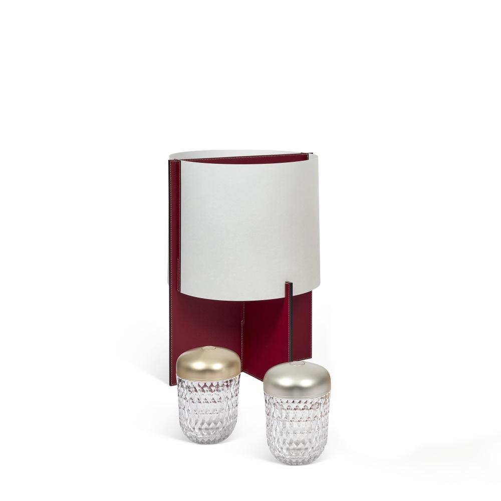 A GROUP OF THREE: TWO CRYSTAL & COPPER FOLIA MINI PORTABLE LAMPS BY SAINT LOUIS & A ROUGE H TAURILLON H LEATHER TABLE LAMP SARAZINE BY JEAN-MICHEL SARAZIN