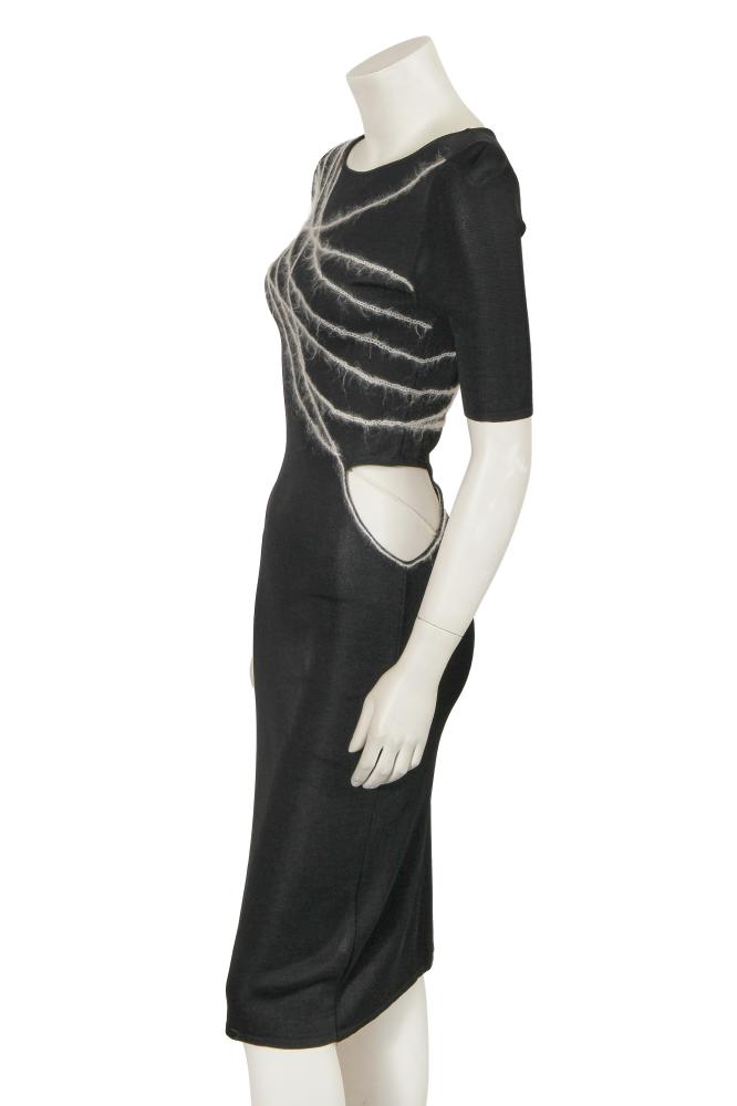 A Donatella Versace black knitted viscose midi dress, Spring-Summer 1998

A Donatella Versace black knitted viscose midi dress, Spring-Summer 1998

Couture label, size 40, with white mohair chainstitch embroidery across bodice, cut-out to left hip, bateau neckline, bust 76-86cm 30-34in

Share this lot: