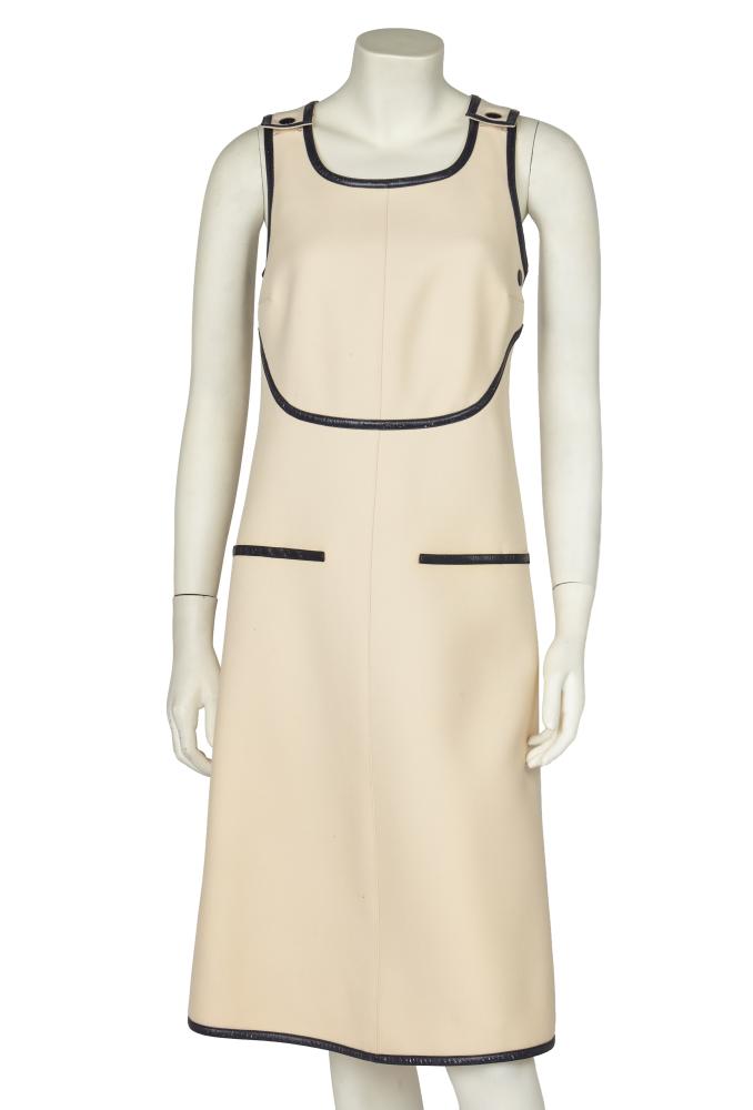An André Courrèges ivory wool pinafore dress, 1970s

An André Courrèges ivory wool pinafore dress, 1970s

Couture Future labelled, style 21496, size a, edged and trimmed with black vinyl, with deep curved yoke, criss-cross back straps, black popper fasteners, bust 81cm 32in, waist 69cm 27in

Share this lot: