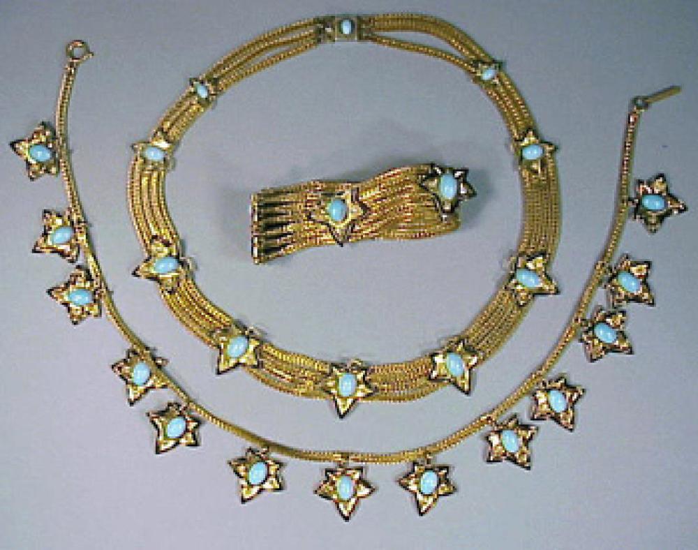 Schiaparelli Gold Star Suite 1940s

Lot 475
Schiaparelli Gold Star Suite 1940s
 1940s 
 Two necklaces and bracelet of gilt chains with pendant stars, marked.