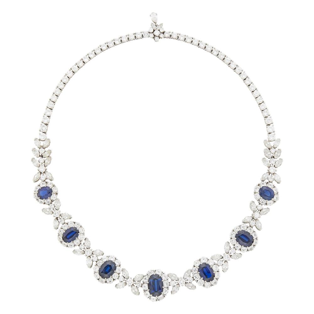 Collection of a Vero Beach Lady7 oval sapphires ap. 20.70 cts., one pear-shaped, 150 round and 42 marquise-shaped diamonds weighing 40.32 cts., weight inscribed, ap. 50 dwts. Length 16 inches.

Sapphires: deep (dark) blue, cleanish to slightly included, lively.Diamonds: G-H-I-VS.Nicely made. Width of sapphire and diamond section 11/16 to 9/16 inch.                             
Any condition statement is given as a courtesy to a client, is an opinion and should not be treated as a statement of fact and our Organization shall have no responsibility for any error or omission. Please contact the specialist department to request further information or additional images that may be available.