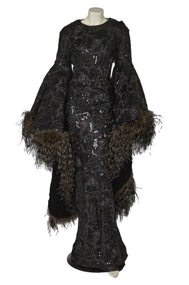 A Pierre Balmain haute couture by Erik Mortensen evening gown, Autumn-Winter 1986-87

A Pierre Balmain haute couture by Erik Mortensen evening gown, Autumn-Winter 1986-87

labelled and numbered 170717, the form-fitting gown entirely covered in black embroidery, appliqués, sequins and rhinestones, the oversized, dramatic trailing bell sleeves trimmed with brown and black ostrich feathers and lined in black velvet, bust 102cm 40in

This dress was purchased by Eunice Walker Johnson of Johnson Publishing Company and worn in the Ebony Fashion Fair. An identical gown is in the collection of the Design Museum Denmark.

Share this lot: