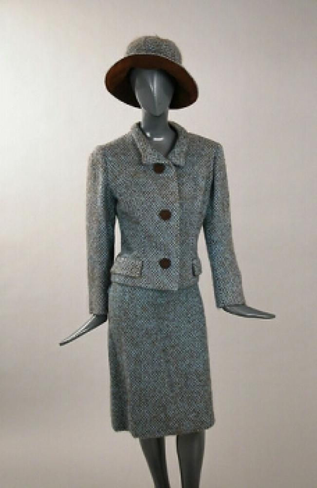 Balmain Brown and Blue Mohair Suit and Hat

Lot 537
Balmain Brown and Blue Mohair Suit and Hat
 French, mid 1960s 
 The jacket waist length and boxy, with brown suede buttons, straight skirt, and hat with turned up brim faced with brown suede, size 8, labeled: Pierre Balmain and tape label no.: 124633.
Excellent condition.