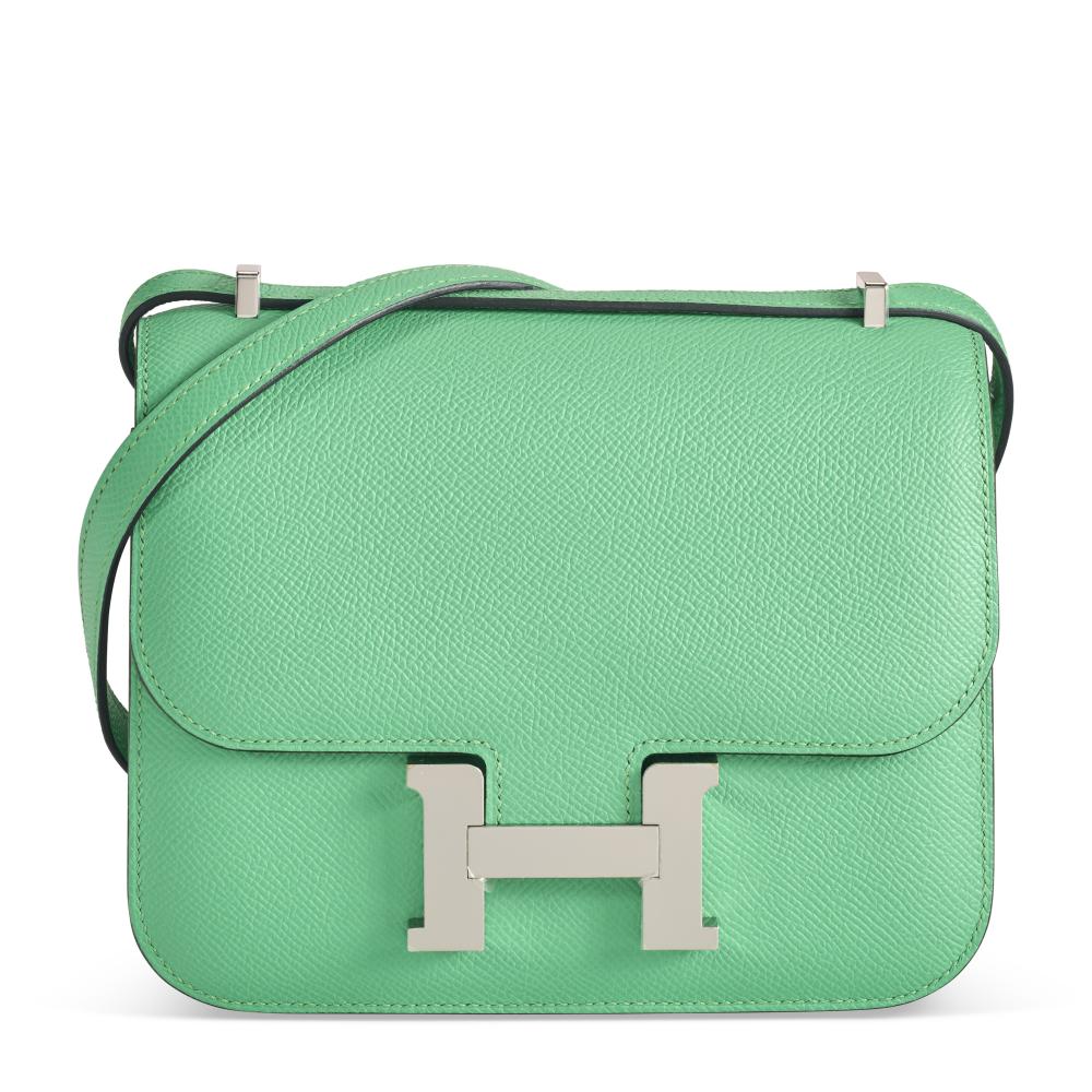 A VERT COMICS EPSOM LEATHER MINI MIRROR CONSTANCE WITH PALLADIUM HARDWARE

HERMÈS, 2023

GRADE: 1 
18 w x 15 h x 5 d cm 
Includes dust bag, felt protector, care card, and box.