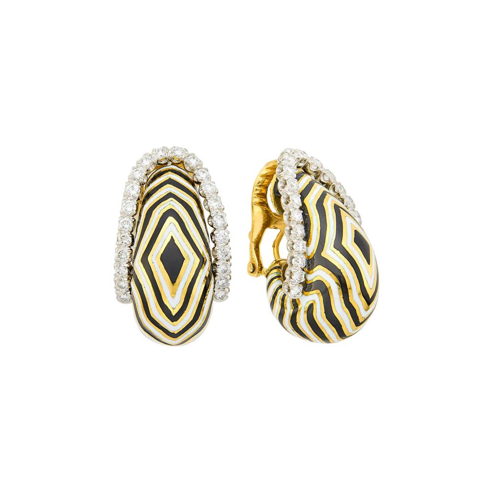 Property from the Collection of Augusta Patton18 kt., 44 round diamonds ap. 1.55 cts., signed David Webb, ap. 23.2 dwts.

Diamonds: H-I-VS.Enamel in good condition.Clip-backs. 1 1/4 x 3/4 inches.                            
Any condition statement is given as a courtesy to a client, is an opinion and should not be treated as a statement of fact and our Organization shall have no responsibility for any error or omission. Please contact the specialist department to request further information or additional images that may be available.