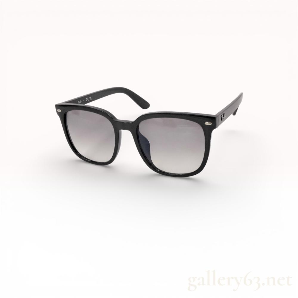 Description
Ray-Ban RB4401D sunglasses, contemporary. Black acetate frame with gradient tinted lenses, silver-tone metal rivets, and raised logo script on temples. Inner left temple marked ID 601/71 57 20 150 3N; includes black pebbled-texture case with Luxottica seal.