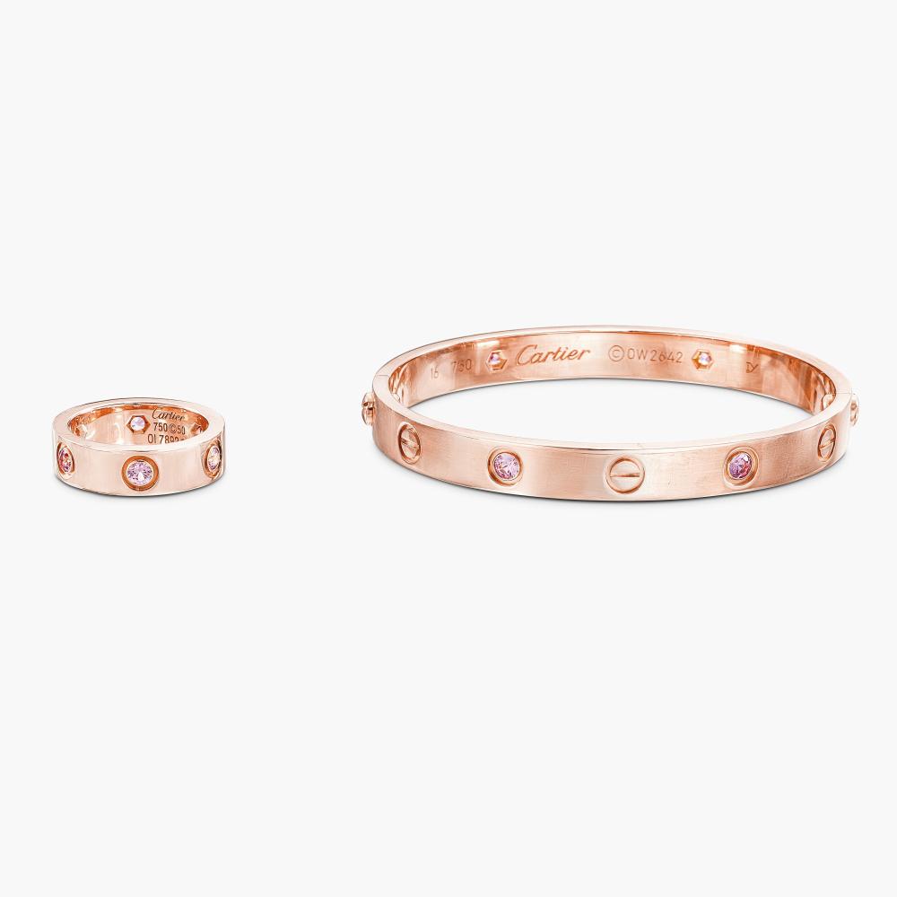Cartier

The bangle decorated with screw motifs set with four circular-cut pink sapphires, and ring set with six circular-cut pink sapphires.