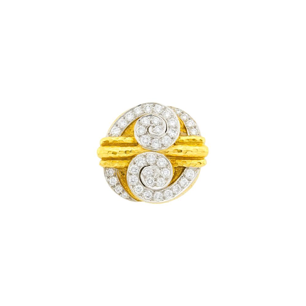 18 kt., 40 round diamonds ap. 1.82 cts., signed David Webb, style no. 30531R, serial no. DS 296, ap. 21 dwts. Size 7, with inner guard.

Diamonds: G-H-I-VS.1 x 15/16 inch.                            
Any condition statement is given as a courtesy to a client, is an opinion and should not be treated as a statement of fact and our Organization shall have no responsibility for any error or omission. Please contact the specialist department to request further information or additional images that may be available.