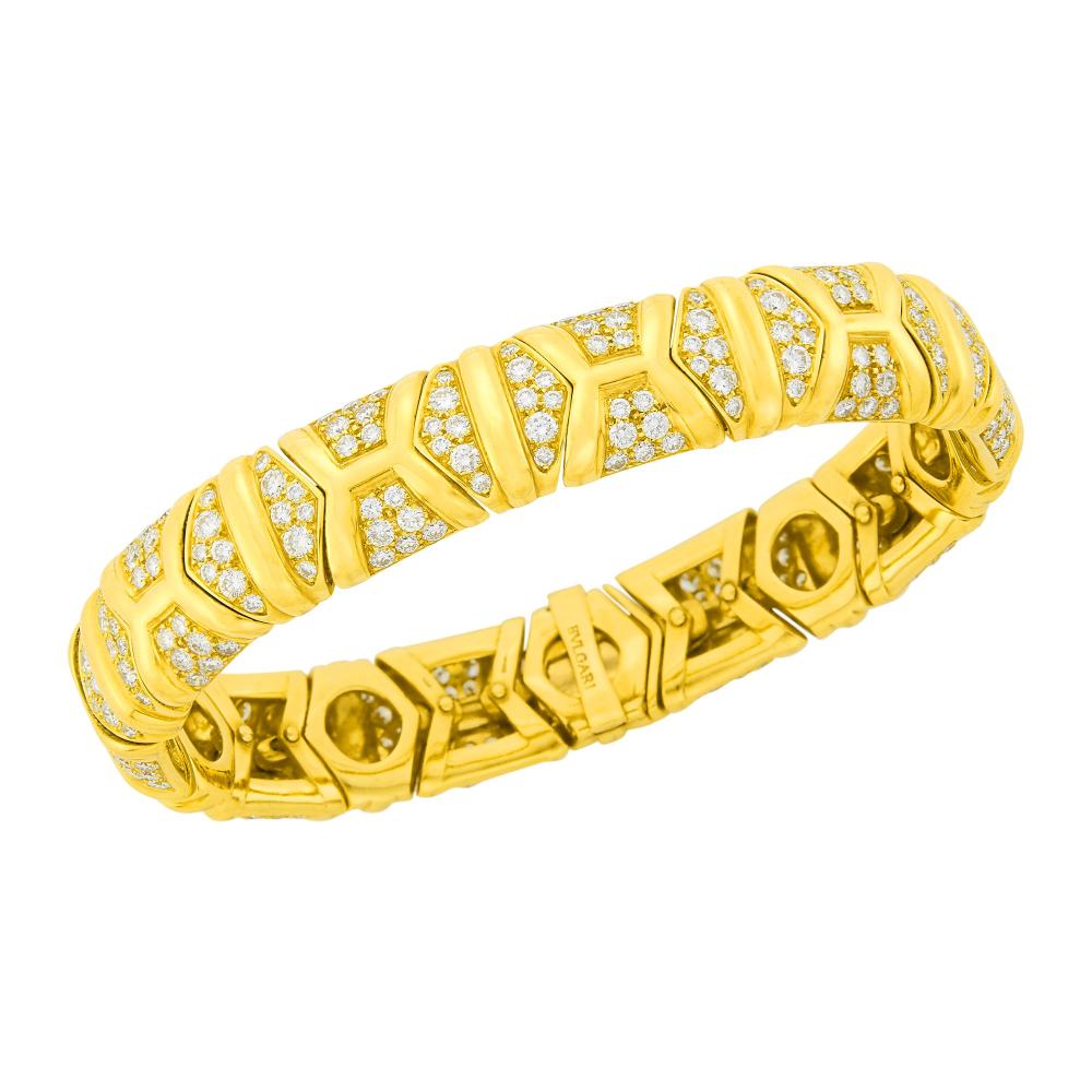 A Distinguished Calabasas Family18 kt., 280 round diamonds ap. 8.20 cts., signed Bulgari, with Italian assay mark, ap. 38 dwts. Length 6 3/4 inches.

Diamonds: G-H-I-VS.Width 1/2 inch.                            
Any condition statement is given as a courtesy to a client, is an opinion and should not be treated as a statement of fact and our Organization shall have no responsibility for any error or omission. Please contact the specialist department to request further information or additional images that may be available.