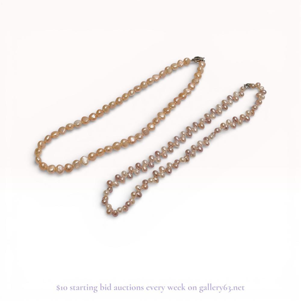 Description
A pair of cultured freshwater pearl necklaces featuring varying colors and shapes. One strand consists of peach-toned baroque pearls with a circular silver filigree box clasp stamped SILVER. The second strand features a tri-color palette of white, blush pink, and lavender oval pearls in a zigzag pattern with a silver-tone filigree clasp.
Length: 16 inches (multi-color necklace).